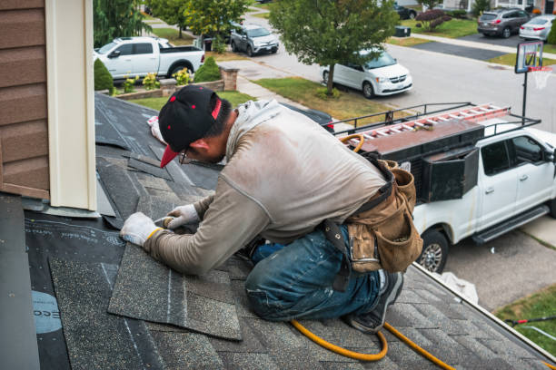 Professional Roofing technician working in Avoca, PA
